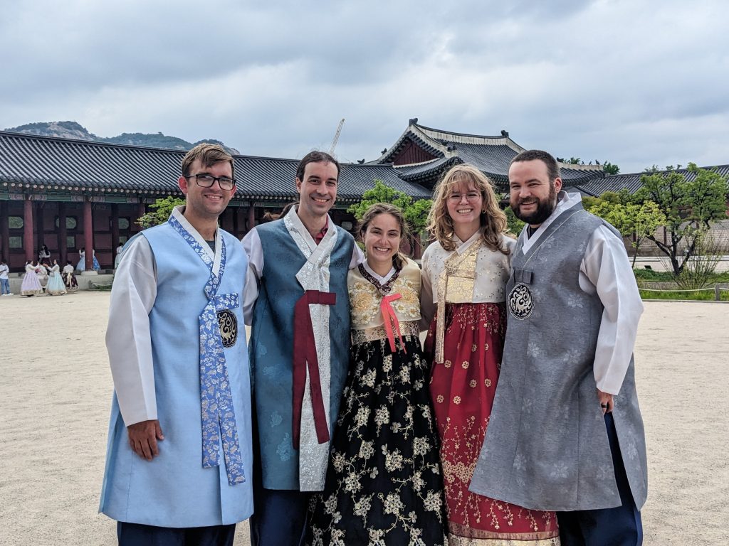 Group photo with students in traditional Korean dress