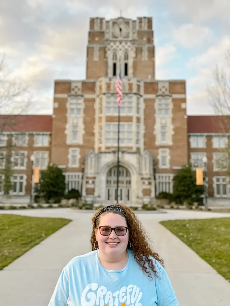 Nicolette Abate stands in front of Ayres Hall on the University of Tennessee's campus.