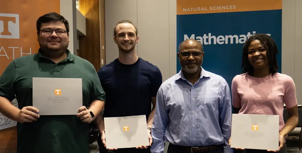 Pictured are Calvin Wong, John McAlister, Dr. Mengesha, and Amber Young.