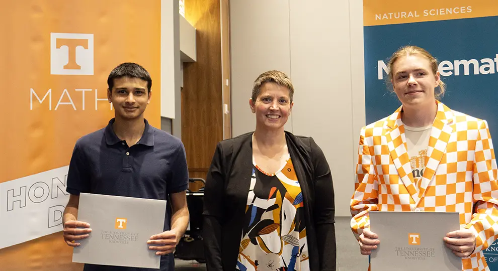 Pictured are Anirudhha Harsha, Dr. Clark, and Austin Newman